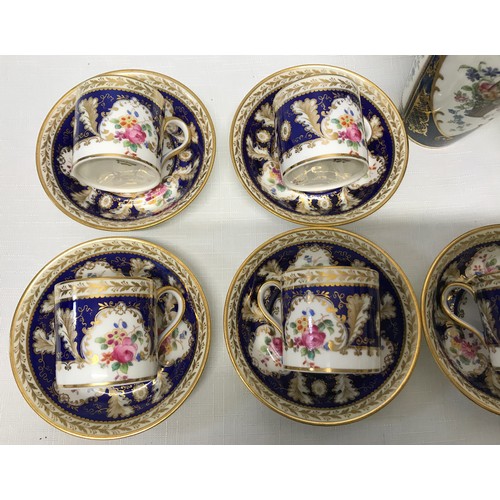 118 - A Cauldron Ltd floral and gilt painted part tea set to include 5 cups 5.5cms h, 6 saucers 11cms d, a... 