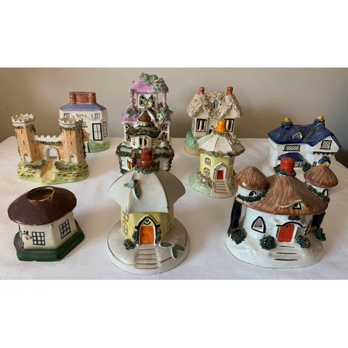 121 - Ten Staffordshire cottages to include money boxes and pastille burners, some 19thC.