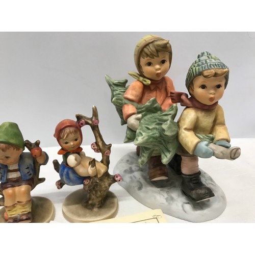 197 - Goebel figurines, Berta Hummel's Tree Trimming Time, with certificate number C2520 approx 15.5cms h ... 