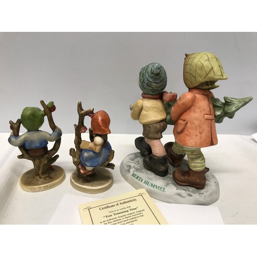 197 - Goebel figurines, Berta Hummel's Tree Trimming Time, with certificate number C2520 approx 15.5cms h ... 