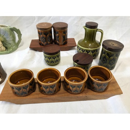 201 - Hornsea pottery selection to include brown and green condiments, egg cups and oil bottle, 6 animal p... 