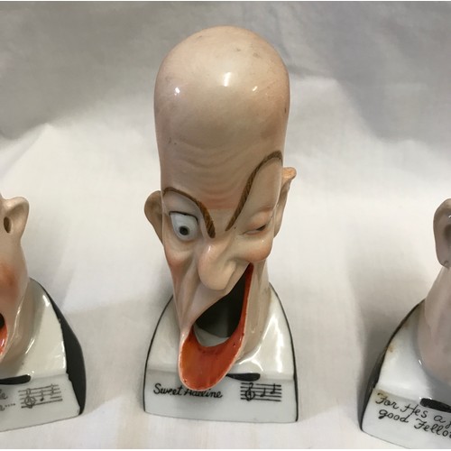 203 - Three novelty singing head ashtray to include 