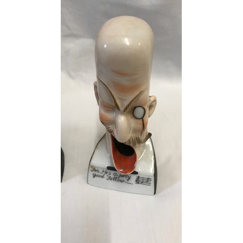 203 - Three novelty singing head ashtray to include 