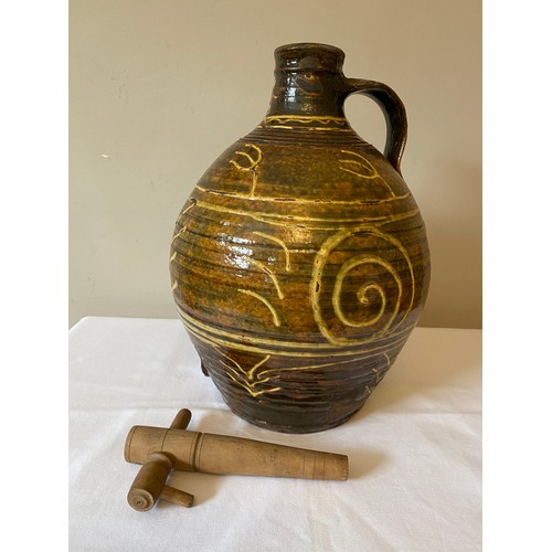 204 - A Michael Cardew Winchcombe Studio Pottery slipware cider flagon with Winchcombe seal marks to base.... 