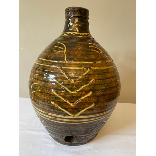 204 - A Michael Cardew Winchcombe Studio Pottery slipware cider flagon with Winchcombe seal marks to base.... 