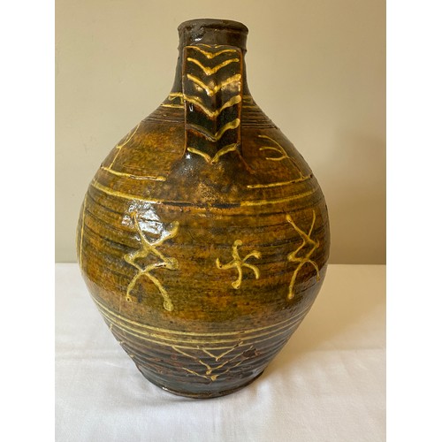 204 - A Michael Cardew Winchcombe Studio Pottery slipware cider flagon with Winchcombe seal marks to base.... 