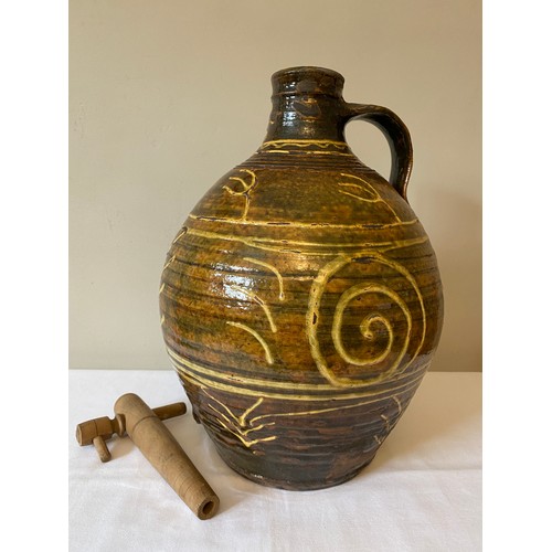 204 - A Michael Cardew Winchcombe Studio Pottery slipware cider flagon with Winchcombe seal marks to base.... 