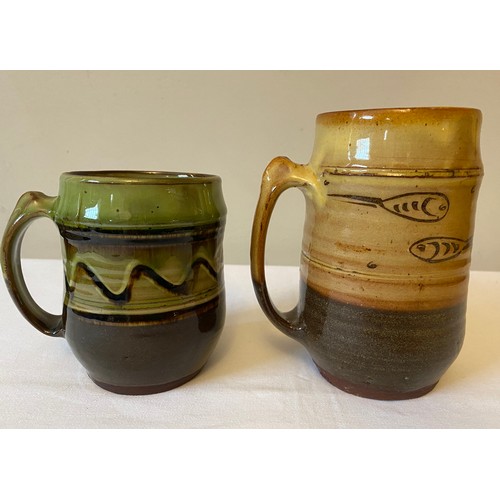 205 - Two Pat Groom Winchcombe Pottery mugs. 15cms and 11.5cms h.