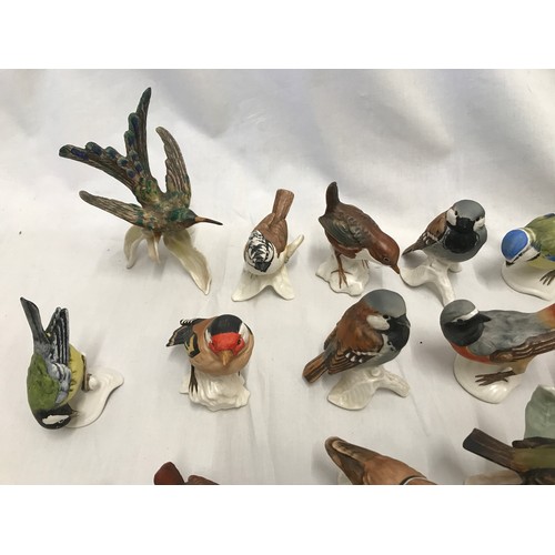 217 - Goebel of West Germany Wildlife collection of 24 ceramic birds, tallest approx 12.5cms. All with Goe... 