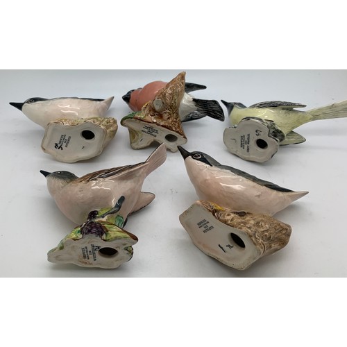 232 - Five Beswick  birds to include Whitethroat, Bullfinch, Grey Wagtail, and 2 Nuthatches in a Crawford'... 