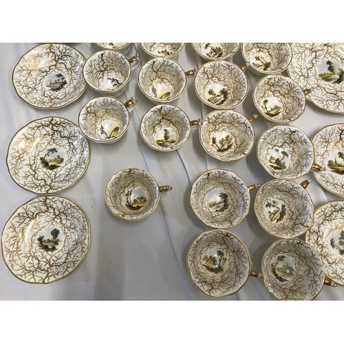 243 - A Rockingham seaweed porcelain part tea service, some pieces bearing the puce factory mark Rockingha... 