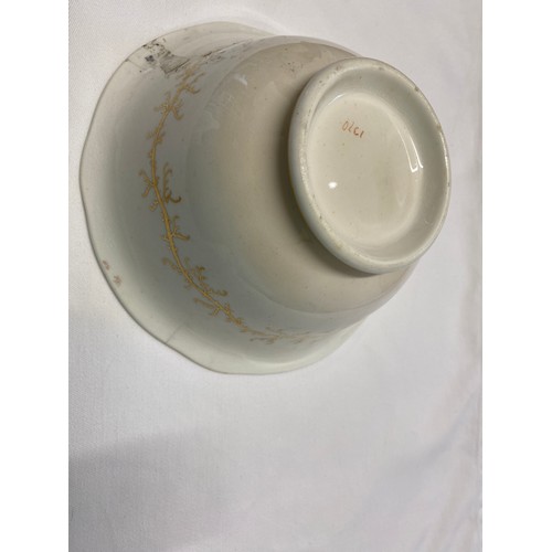 243 - A Rockingham seaweed porcelain part tea service, some pieces bearing the puce factory mark Rockingha... 