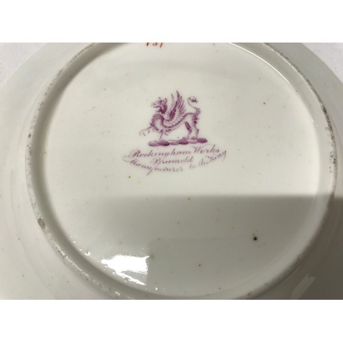 243 - A Rockingham seaweed porcelain part tea service, some pieces bearing the puce factory mark Rockingha... 