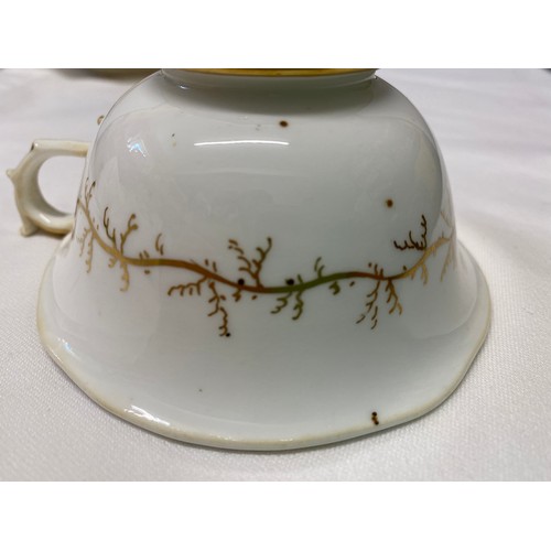 243 - A Rockingham seaweed porcelain part tea service, some pieces bearing the puce factory mark Rockingha... 