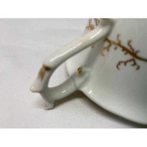 243 - A Rockingham seaweed porcelain part tea service, some pieces bearing the puce factory mark Rockingha... 