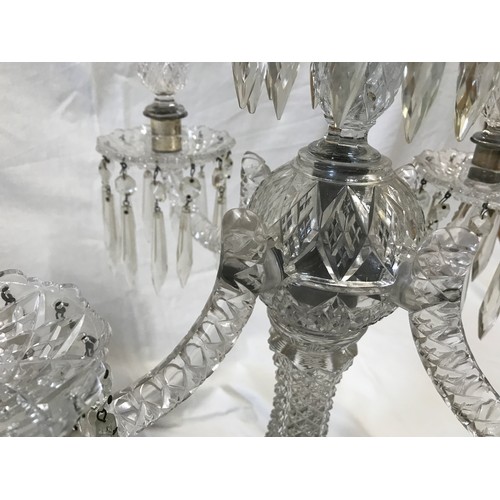 264 - A large glass five branch candelabra, 59cm h x 47cm w, base width 22cm.