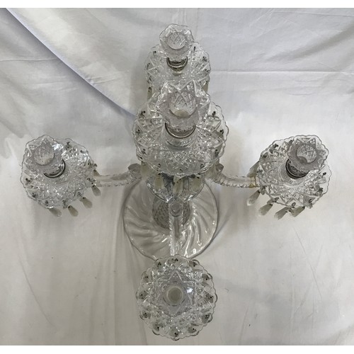 264 - A large glass five branch candelabra, 59cm h x 47cm w, base width 22cm.