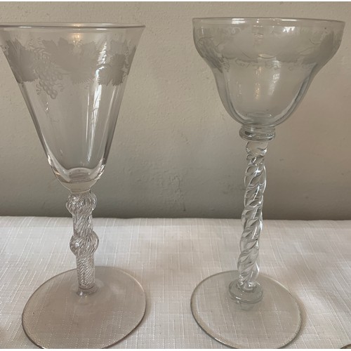 270 - Four 18thC Georgian drinking glasses, 2 with faceted stems and bowls, others engraved with grapes an... 