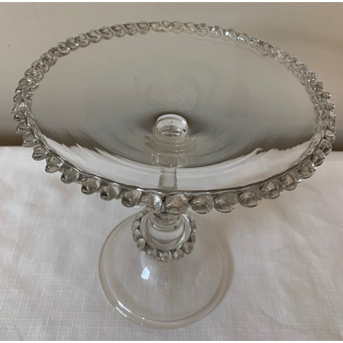 271 - A Georgian glass tazza circa 1800 with folded foot. 21cms h.