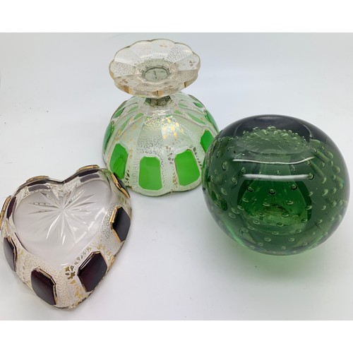 273 - A 19thC green glass dump with bubbles and 2 glass and gilt decorated dishes.