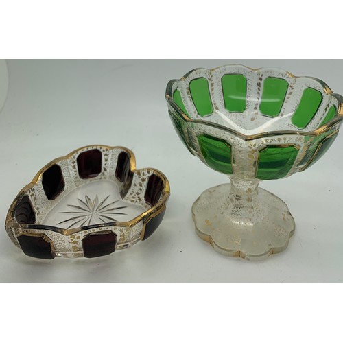 273 - A 19thC green glass dump with bubbles and 2 glass and gilt decorated dishes.