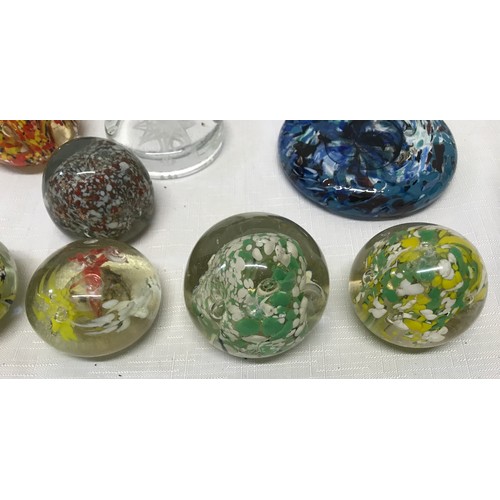 283 - A collection of 22 unmarked glass paperweight, floral, bubble, multicoloured etc.