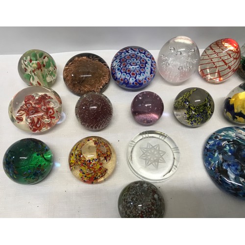 283 - A collection of 22 unmarked glass paperweight, floral, bubble, multicoloured etc.