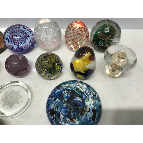 283 - A collection of 22 unmarked glass paperweight, floral, bubble, multicoloured etc.