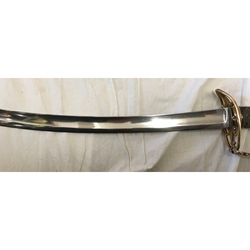 893 - A light cavalry sword circa 1800 with brass lions head handle. Blade length approx. 76cms, overall l... 