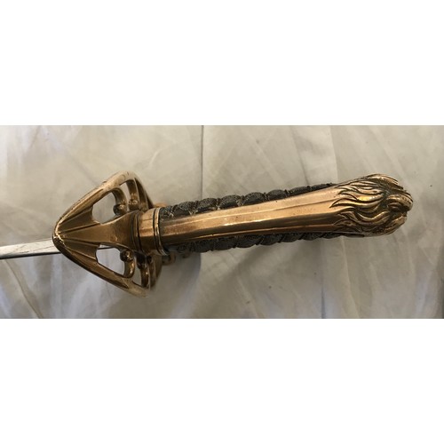 893 - A light cavalry sword circa 1800 with brass lions head handle. Blade length approx. 76cms, overall l... 