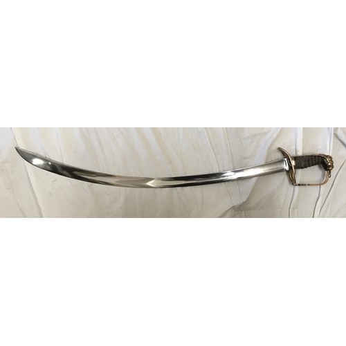 893 - A light cavalry sword circa 1800 with brass lions head handle. Blade length approx. 76cms, overall l... 