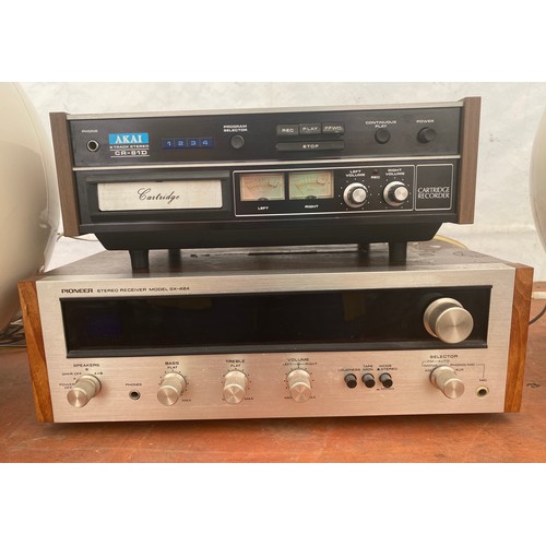 916 - An Akai stack stereo CR-81D Cartridge Recorder, a wood veneered Pioneer Stereo Receiver model SX-424... 