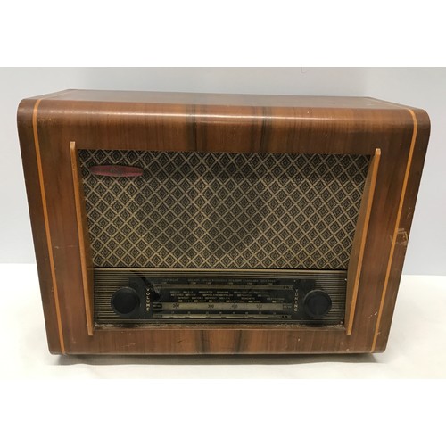 917 - A PYE walnut cased radio. Type P75. 41cms w x 31cms h x 19cms d.