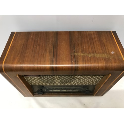 917 - A PYE walnut cased radio. Type P75. 41cms w x 31cms h x 19cms d.