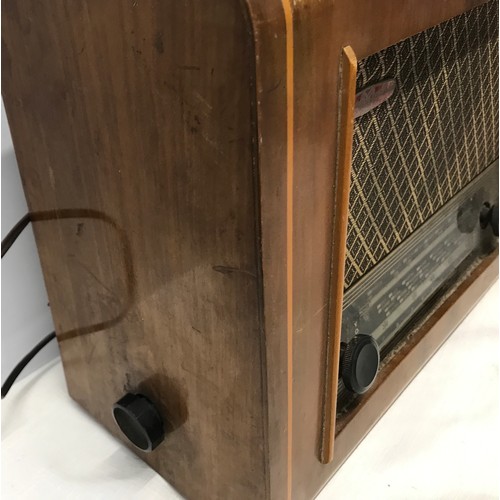 917 - A PYE walnut cased radio. Type P75. 41cms w x 31cms h x 19cms d.