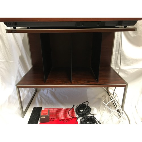 919 - A Bang and Olufsen Beocenter 7007 record deck, cassette and tuner on a Bang and Olufsen rosewood and... 