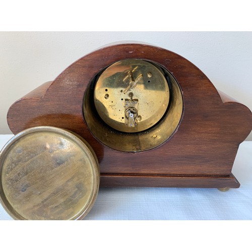 930 - An Edwardian inlaid mantle clock. 16.5cms x 25cms.