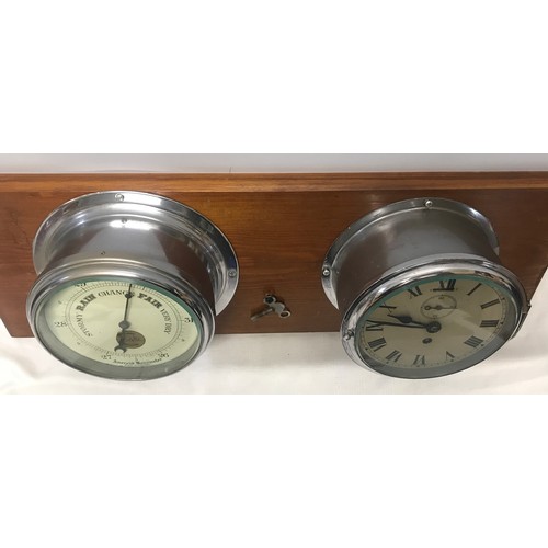 932 - A chrome cased ships clock and aneroid barometer mounted on pine by Cooke of Hull. Back plate width ... 