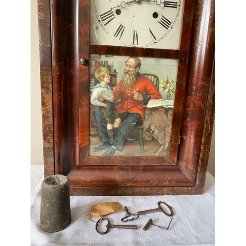934 - An American Seth Thomas wall mounted cased clock with walnut veneer and Victorian print to door pane... 