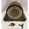 Oak mantle clock, Westminster chimes with key, 22cms h x 29cms w.