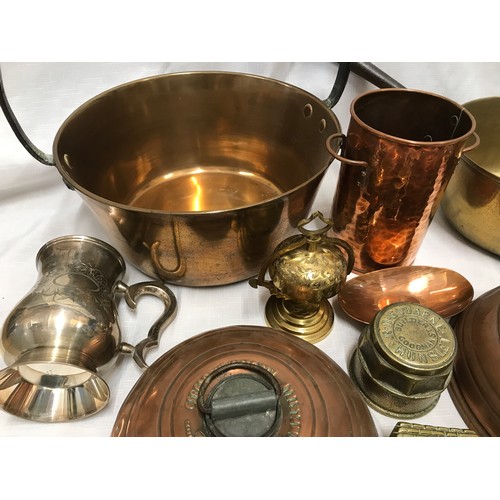 944 - Copper and brassware, large and small jam pans, two copper bed warmers, oil lamp with gimble mount, ... 