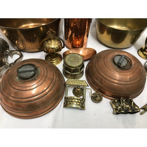 944 - Copper and brassware, large and small jam pans, two copper bed warmers, oil lamp with gimble mount, ... 