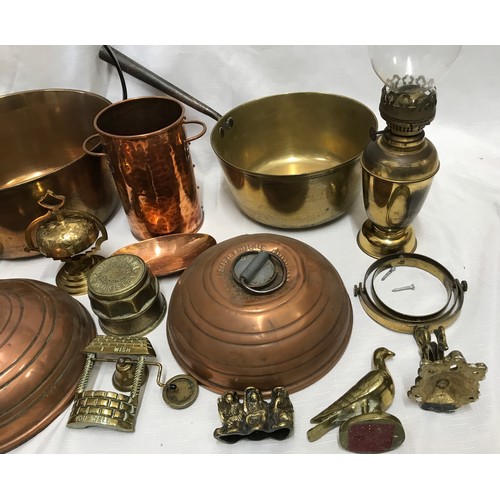 944 - Copper and brassware, large and small jam pans, two copper bed warmers, oil lamp with gimble mount, ... 