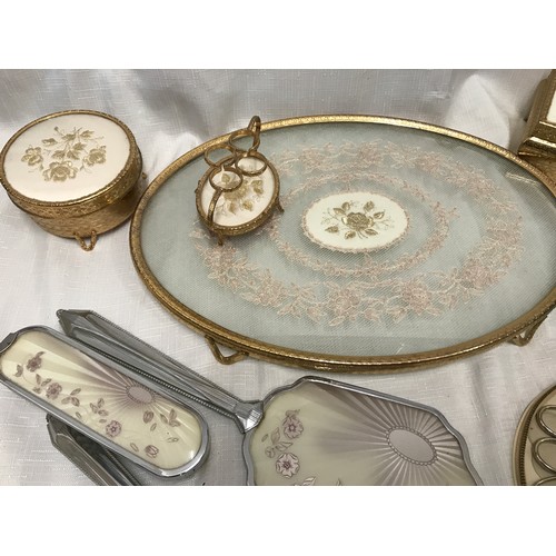 945 - Gilt metal and needlework dressing table set, 4 pieces, Regent of London, chrome vanity brush and mi... 