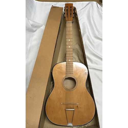 949 - A 1960's/70's acoustic guitar possibly Hornby make with packaging box.