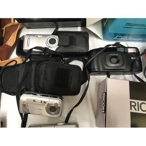 958 - Collection of cameras including 2 old Conway and a box camera, Modern Ricoh, Olympus, Praktika, Pola... 