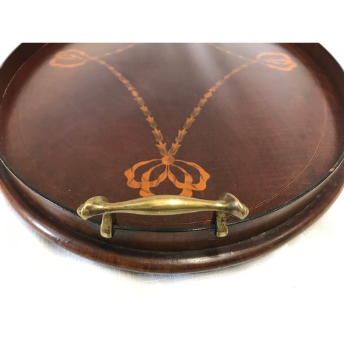 959 - Large mahogany oval tray with brass handles and painted swag decoration and folding stand base. 68 x... 