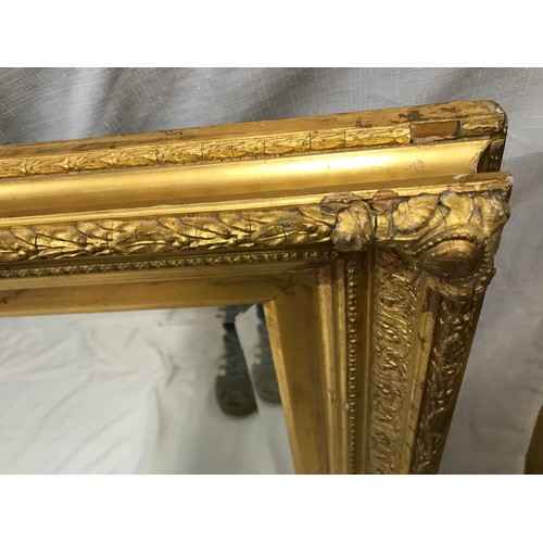 963 - Large decorative gilt framed bevel edged wall mirror.
Mirror size 70cm x 47cm. Frame size 91cm x 68c... 