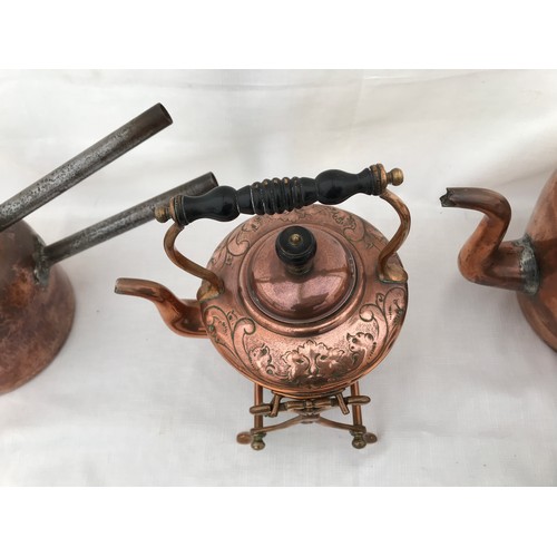 969 - A collection of copper to include a spirit kettle 28cm, a large kettle 31cm, a double saucepan 17cm ... 