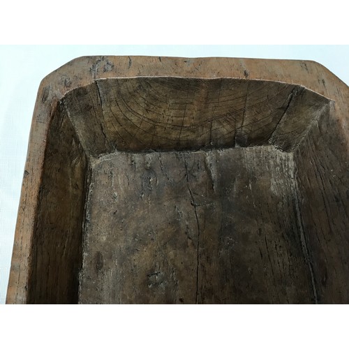 970 - A rustic hand craved wooden tray 37.5cm l x 26cm w x 6cm d together with a hand craved heavy wooden ... 